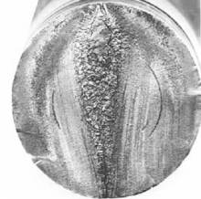 How does the fatigue fracture of cemented carbide material occur? 2